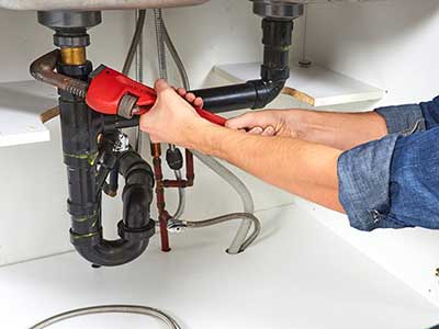 Plumber-with-Wrench-1 ABelectrical Hot-Water-System installation